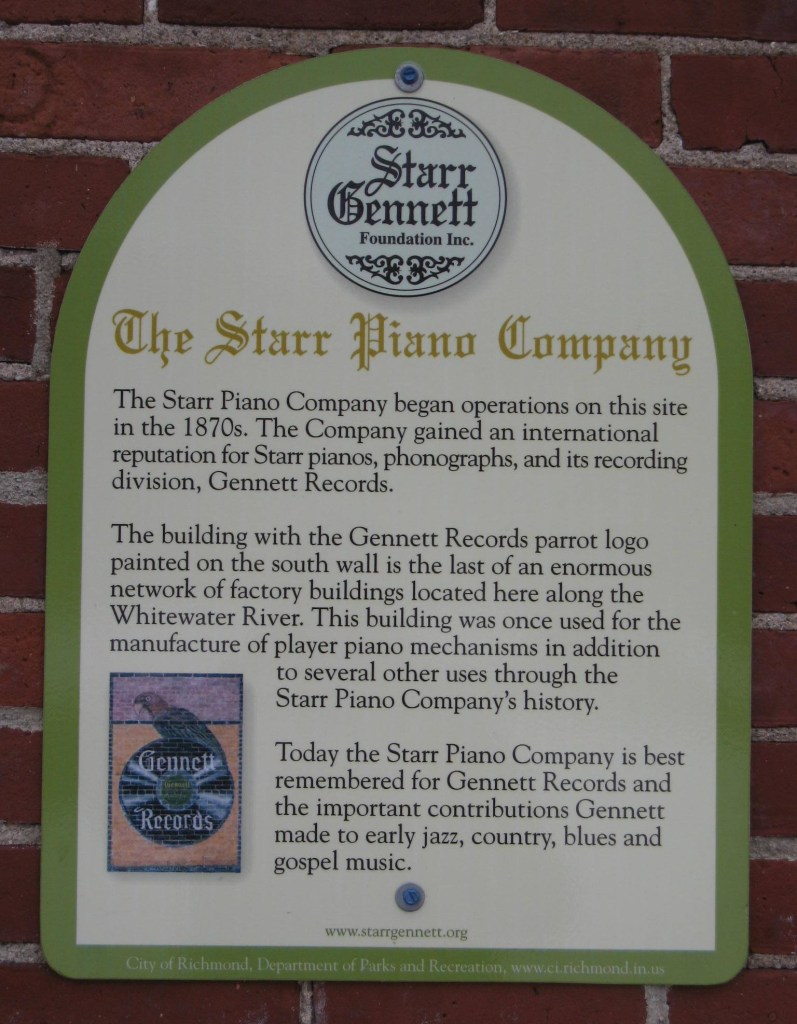 a historic plaque on the side of the building.